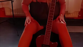 Amateur Girl Teases With Her Biggest Tits And Guitar