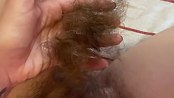 Up-Close View Of A Blonde Girl Shaving Her Long Pussy Hair